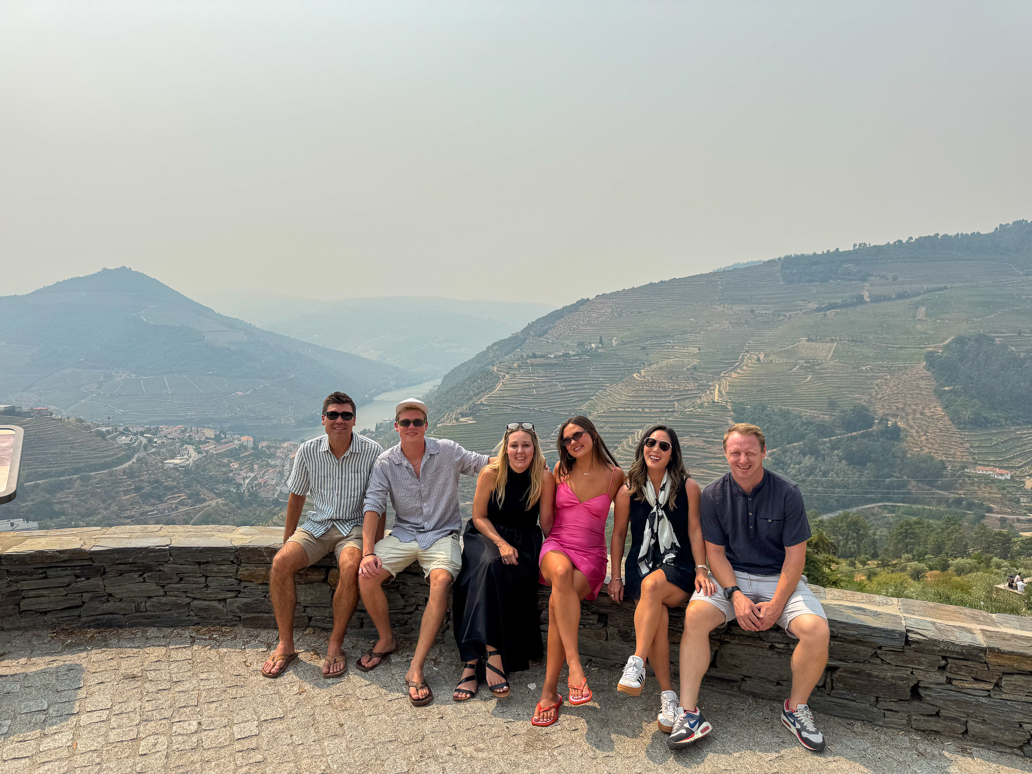 Erika, Mark & family with view of Douro Valley and river behind them